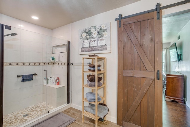 7063 Dover Ln, Richland Hills, TX 76118 - full bathroom featuring a stall shower and wood finished floors