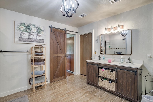 7063 Dover Ln, Richland Hills, TX 76118 - full bathroom with double vanity, wood finished floors, a chandelier, and a tile shower