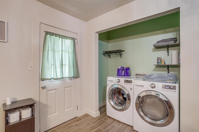 7063 Dover Ln, Richland Hills, TX 76118 - laundry area with washer and clothes dryer and wood tiled floors