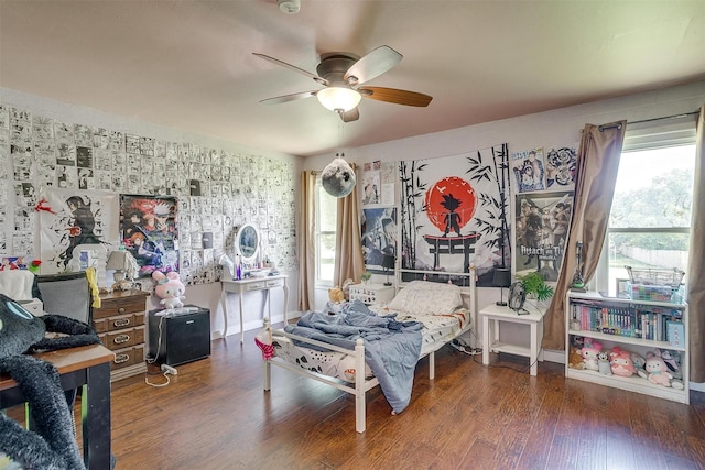 7063 Dover Ln, Richland Hills, TX 76118 - bedroom featuring wood finished floors, multiple windows, and a ceiling fan