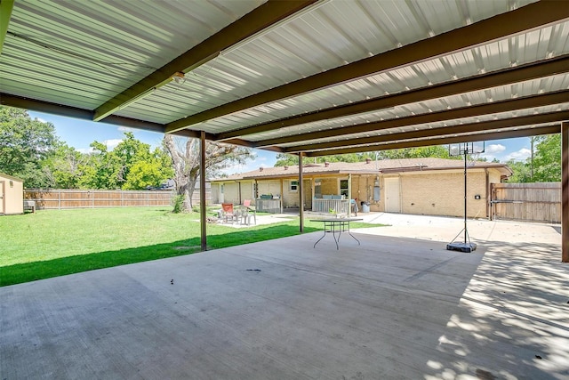 7063 Dover Ln, Richland Hills, TX 76118 - fenced backyard featuring a patio and an outdoor structure
