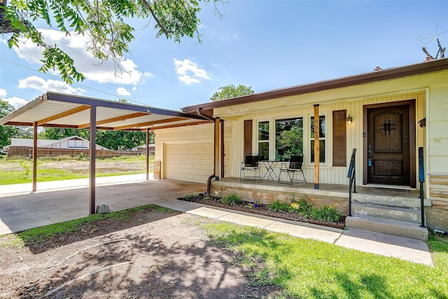 7063 Dover Ln, Richland Hills, TX 76118 - view of front facade featuring covered porch, an attached garage, driveway, and an attached carport