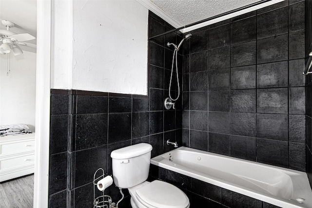 306 Country Club Dr, Joshua, TX 76058 - full bath featuring tiled shower / bath combo, ceiling fan, tile walls, a textured ceiling, and ornamental molding