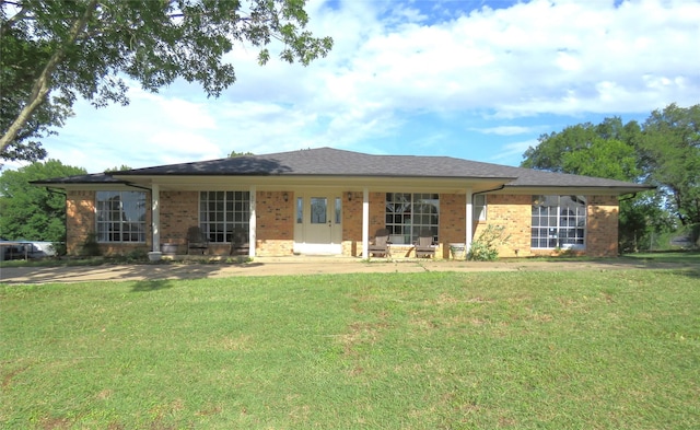 306 Country Club Dr, Joshua, TX 76058 - view of front facade featuring brick siding and a front lawn