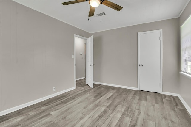 2050 Kyle Dr, Paris, TX 75460 - spare room with ceiling fan and wood finished floors