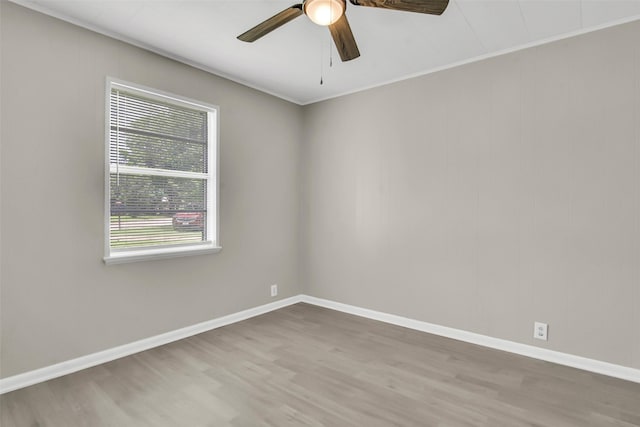 2050 Kyle Dr, Paris, TX 75460 - empty room with wood finished floors and a ceiling fan