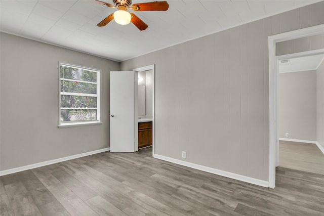 2050 Kyle Dr, Paris, TX 75460 - unfurnished room featuring ceiling fan and wood finished floors