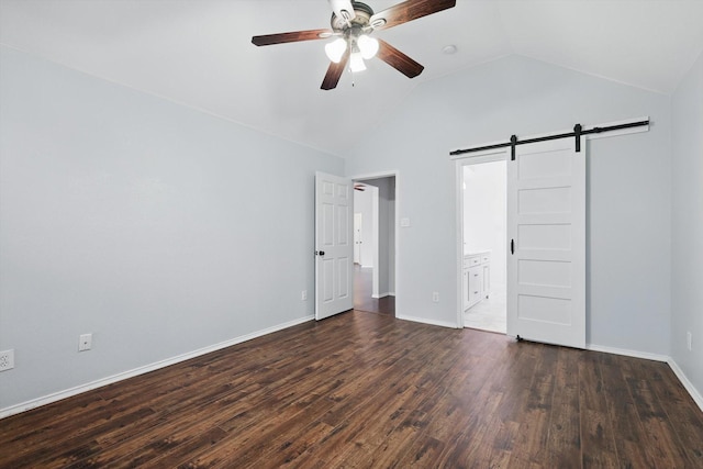 4704 Misty Ridge Dr, Fort Worth, TX 76137 - unfurnished bedroom featuring a barn door, lofted ceiling, dark wood-type flooring, ensuite bath, and ceiling fan