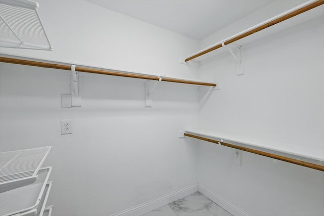 4704 Misty Ridge Dr, Fort Worth, TX 76137 - walk in closet with light marble finish floors