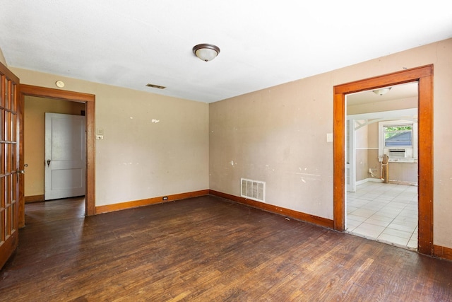 800 N Woods St, Sherman, TX 75092 - unfurnished room with wood finished floors and baseboards