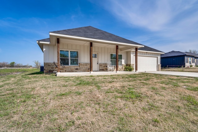 337 Hcr 1345, Hillsboro, TX 76645 - ranch-style house with board and batten siding, concrete driveway, a porch, and a front yard