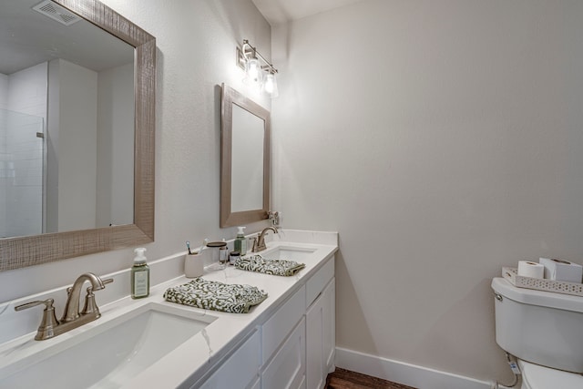 337 Hcr 1345, Hillsboro, TX 76645 - full bath featuring double vanity, a tile shower, and wood finished floors
