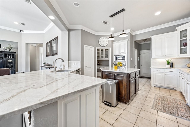 5651 Lucca Dr, Fort Worth, TX 76140 - kitchen with glass insert cabinets, light tile patterned floors, appliances with stainless steel finishes, tasteful backsplash, and ornamental molding