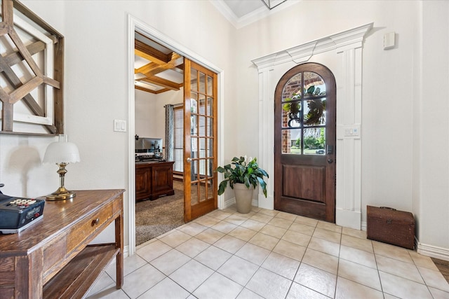 5651 Lucca Dr, Fort Worth, TX 76140 - entryway with crown molding, light tile patterned flooring, french doors, beam ceiling, and coffered ceiling