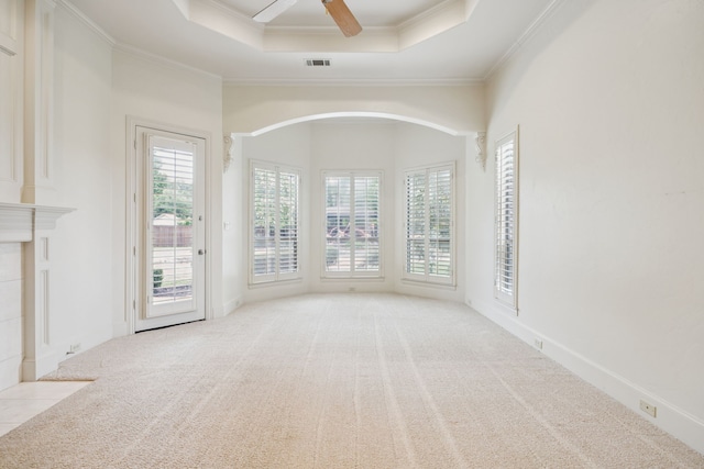 205 Suncreek Dr, Allen, TX 75013 - unfurnished living room featuring carpet, crown molding, a ceiling fan, and a tray ceiling