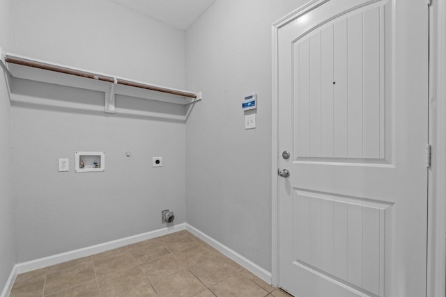 920 Fox Grove Ln, Providence Village, TX 76227 - washroom featuring electric dryer hookup, hookup for a gas dryer, hookup for a washing machine, and light tile patterned floors