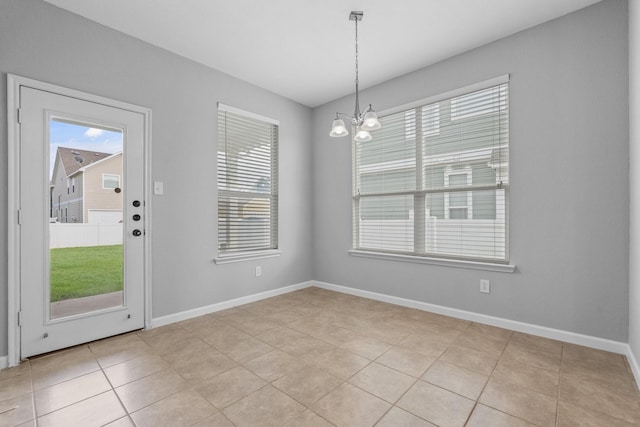 920 Fox Grove Ln, Providence Village, TX 76227 - unfurnished dining area featuring a chandelier and light tile patterned floors