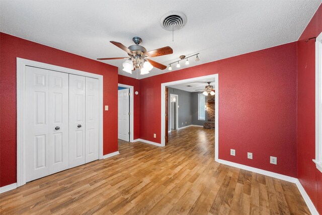 3808 Leland Ave, Waco, TX 76708 - spare room featuring a ceiling fan, light wood finished floors, and a textured ceiling