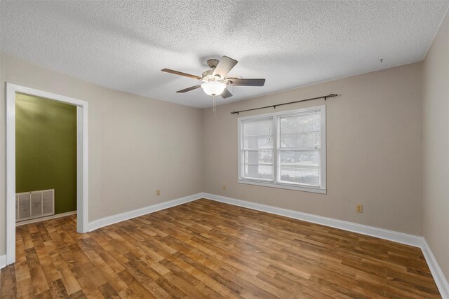 3808 Leland Ave, Waco, TX 76708 - laundry room with wallpapered walls, separate washer and dryer, a textured ceiling, ceiling fan, and light flooring