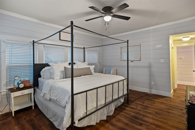 714 W Ball St, Weatherford, TX 76086 - bedroom featuring wood walls, wood finished floors, and ceiling fan
