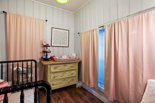 714 W Ball St, Weatherford, TX 76086 - bedroom with dark wood-style floors and ornamental molding