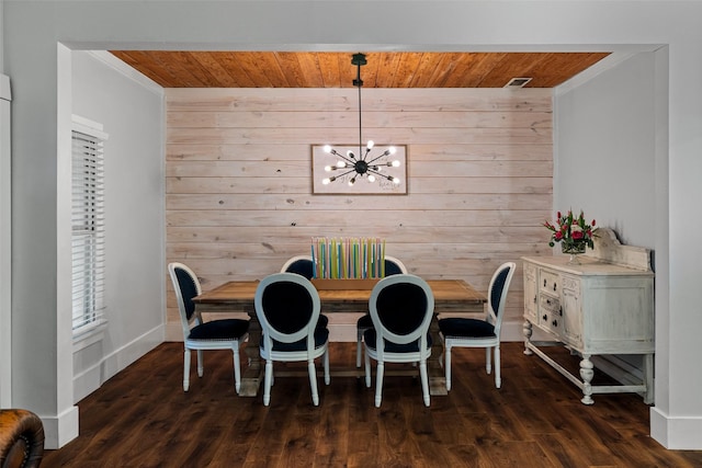 714 W Ball St, Weatherford, TX 76086 - dining room with a chandelier, wood walls, ornamental molding, wooden ceiling, and dark wood finished floors