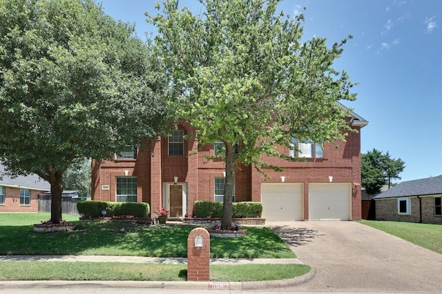 1013 Lilac Ln, Desoto, TX 75115 - view of front of home with driveway, a garage, a front yard, and brick siding