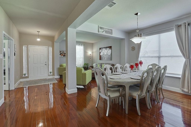 1013 Lilac Ln, Desoto, TX 75115 - dining space with wood-type flooring and healthy amount of natural light