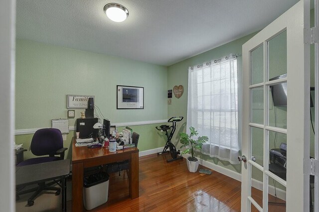 1013 Lilac Ln, Desoto, TX 75115 - office with wood finished floors and baseboards