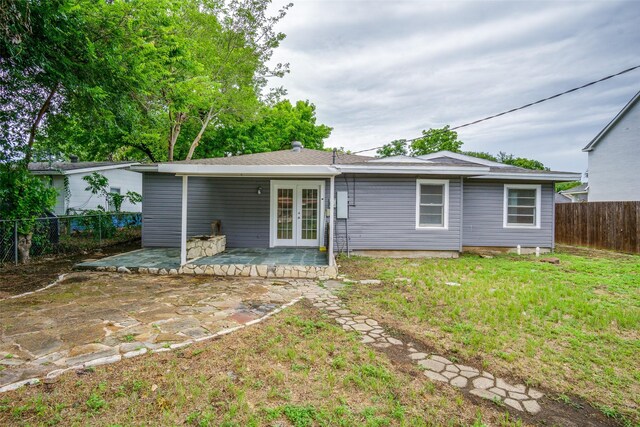 5861 Coleman St, Westworth Village, TX 76114 - rear view of property with french doors, a patio, and a fenced backyard