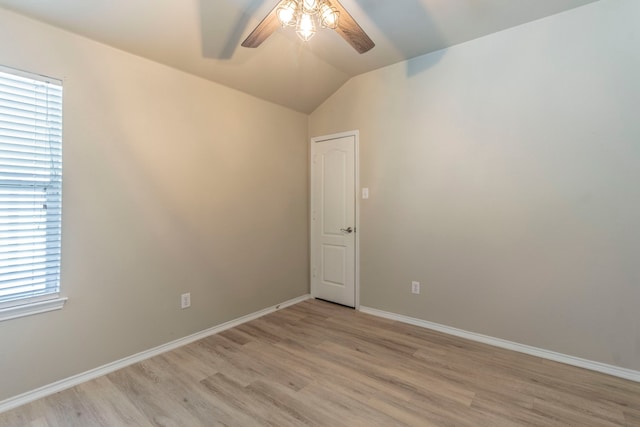 8128 Guadalupe Rd, Arlington, TX 76002 - empty room with ceiling fan, light wood-style flooring, and lofted ceiling