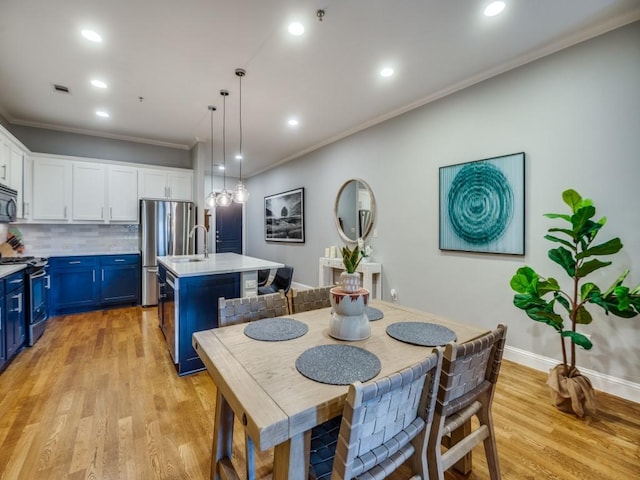 5800 Mccommas Blvd Unit A108, Dallas, TX 75206 - dining room with ornamental molding, light wood finished floors, and recessed lighting