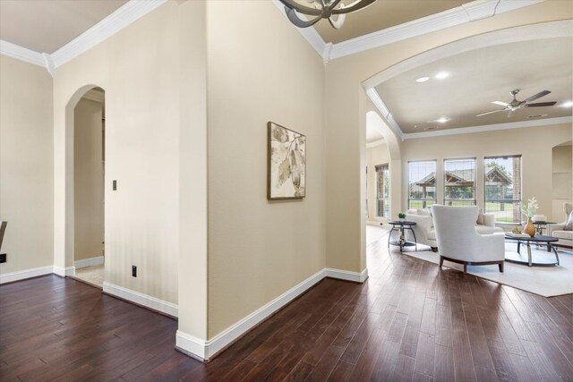 18044 Langford Ln, Talty, TX 75126 - living area featuring arched walkways, ceiling fan, ornamental molding, dark wood-style flooring, and recessed lighting