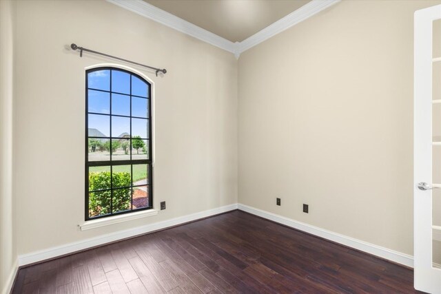 18044 Langford Ln, Talty, TX 75126 - spare room featuring ornamental molding and dark wood-type flooring