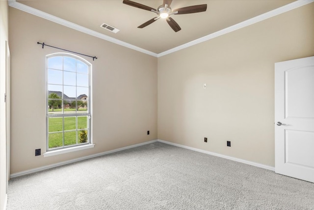 18044 Langford Ln, Talty, TX 75126 - empty room with ornamental molding, a ceiling fan, healthy amount of natural light, and carpet