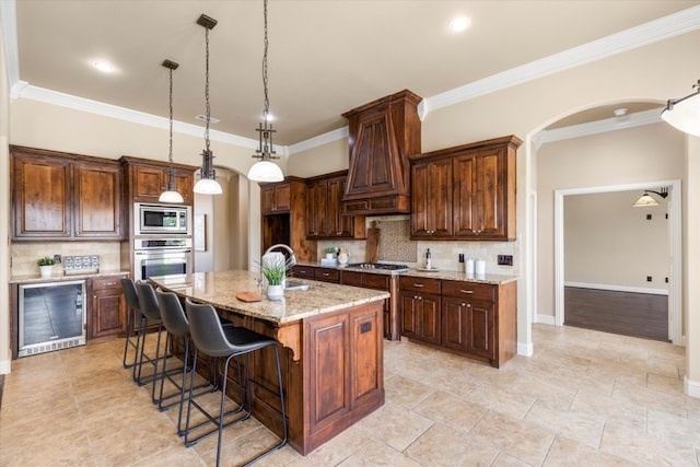 18044 Langford Ln, Talty, TX 75126 - kitchen with stainless steel appliances, beverage cooler, arched walkways, backsplash, and ornamental molding