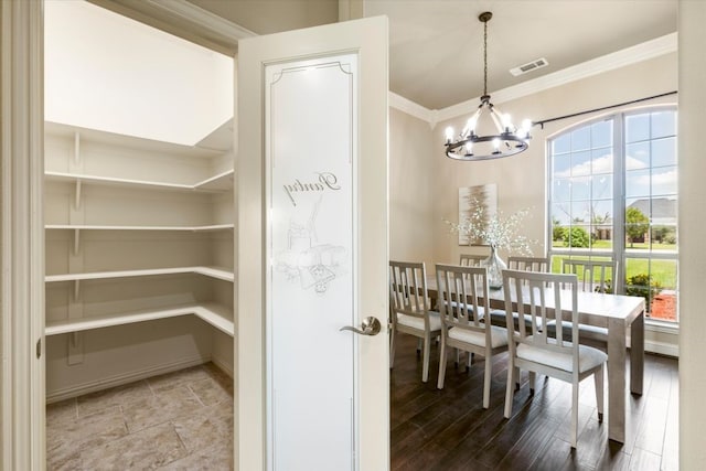 18044 Langford Ln, Talty, TX 75126 - dining area with a chandelier and crown molding