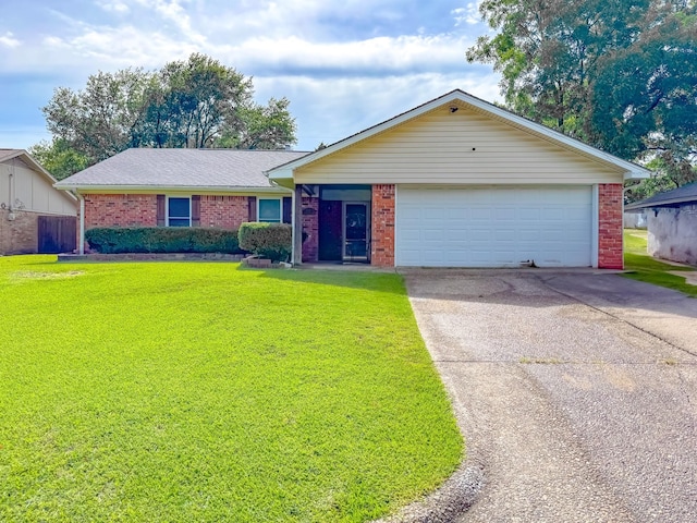 3112 Louis Ave, Corsicana, TX 75110 - ranch-style home with brick siding, a front lawn, and concrete driveway