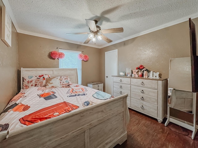 3112 Louis Ave, Corsicana, TX 75110 - bedroom featuring crown molding, a textured wall, a textured ceiling, dark wood-style flooring, and a ceiling fan