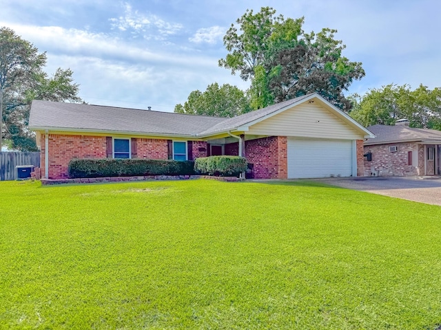 3112 Louis Ave, Corsicana, TX 75110 - ranch-style home featuring brick siding, an attached garage, asphalt driveway, and roof with shingles