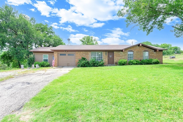 800 Farrar Rd, Waxahachie, TX 75165 - ranch-style house with an attached garage, brick siding, asphalt driveway, and a front yard