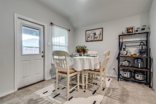 632 Peshtigo Rd, Justin, TX 76247 - dining area featuring vaulted ceiling and baseboards