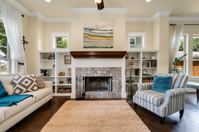 2309 Ryan Ave, Fort Worth, TX 76110 - living area featuring recessed lighting, healthy amount of natural light, crown molding, and a tile fireplace