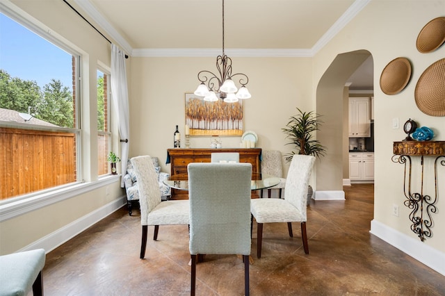 2309 Ryan Ave, Fort Worth, TX 76110 - dining space featuring concrete flooring, plenty of natural light, crown molding, a chandelier, and arched walkways