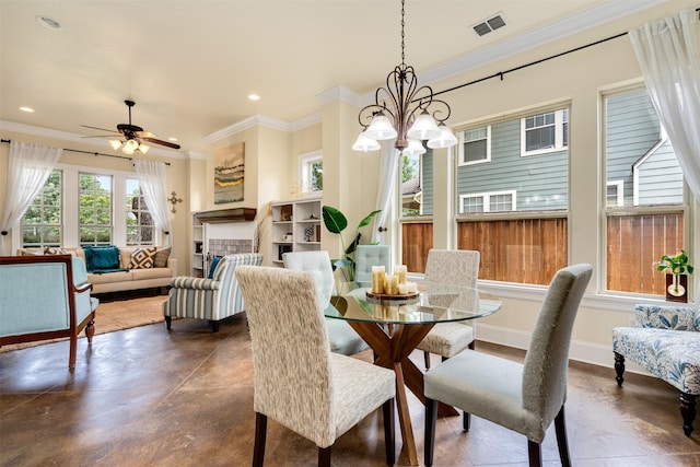 2309 Ryan Ave, Fort Worth, TX 76110 - dining space with concrete flooring, recessed lighting, crown molding, a chandelier, and ceiling fan