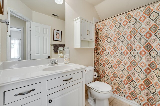 2309 Ryan Ave, Fort Worth, TX 76110 - full bath with vanity, tile patterned floors, and a shower with curtain