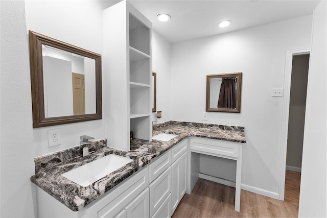310 Lexington Ave, Abilene, TX 79605 - full bath featuring double vanity, wood finished floors, and recessed lighting