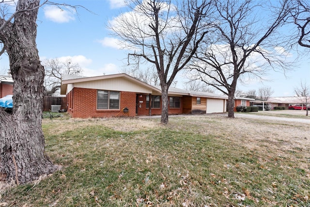 310 Lexington Ave, Abilene, TX 79605 - view of front of home with an attached garage and brick siding