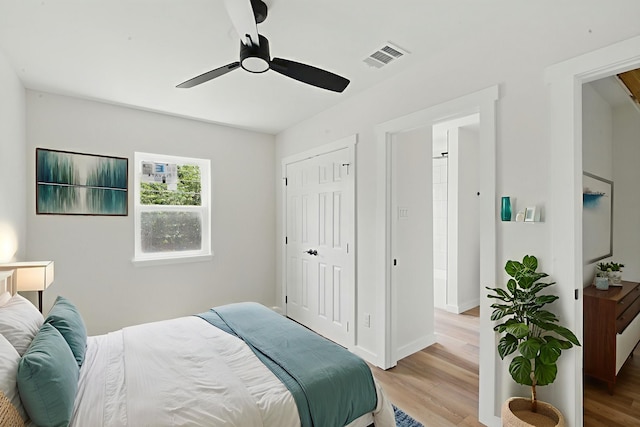 903 N Miller St, Decatur, TX 76234 - bedroom featuring light wood-style floors, a ceiling fan, and a closet