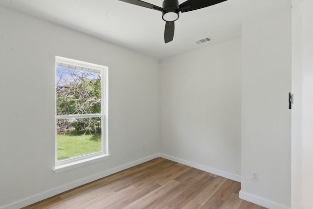 903 N Miller St, Decatur, TX 76234 - unfurnished room featuring healthy amount of natural light, light wood-style flooring, and ceiling fan